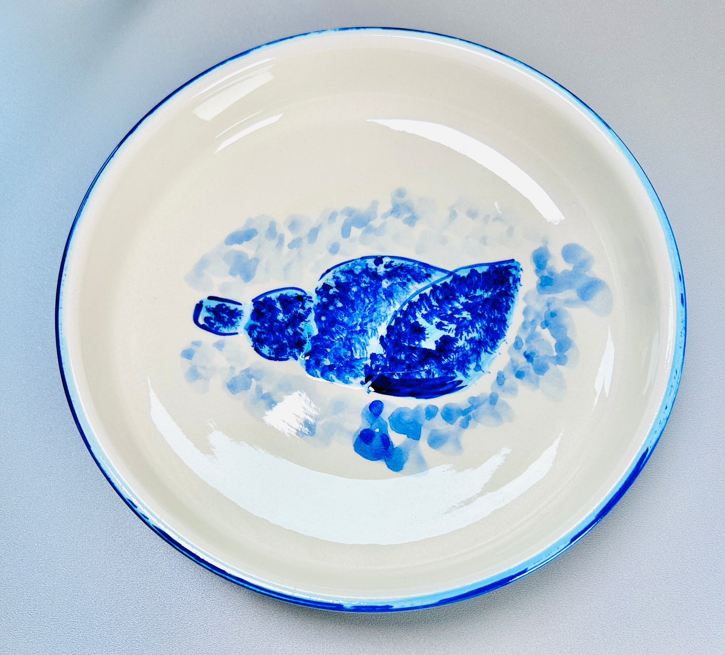 Teller flach "Pazifia", Rand blau (Ø 26 cm)