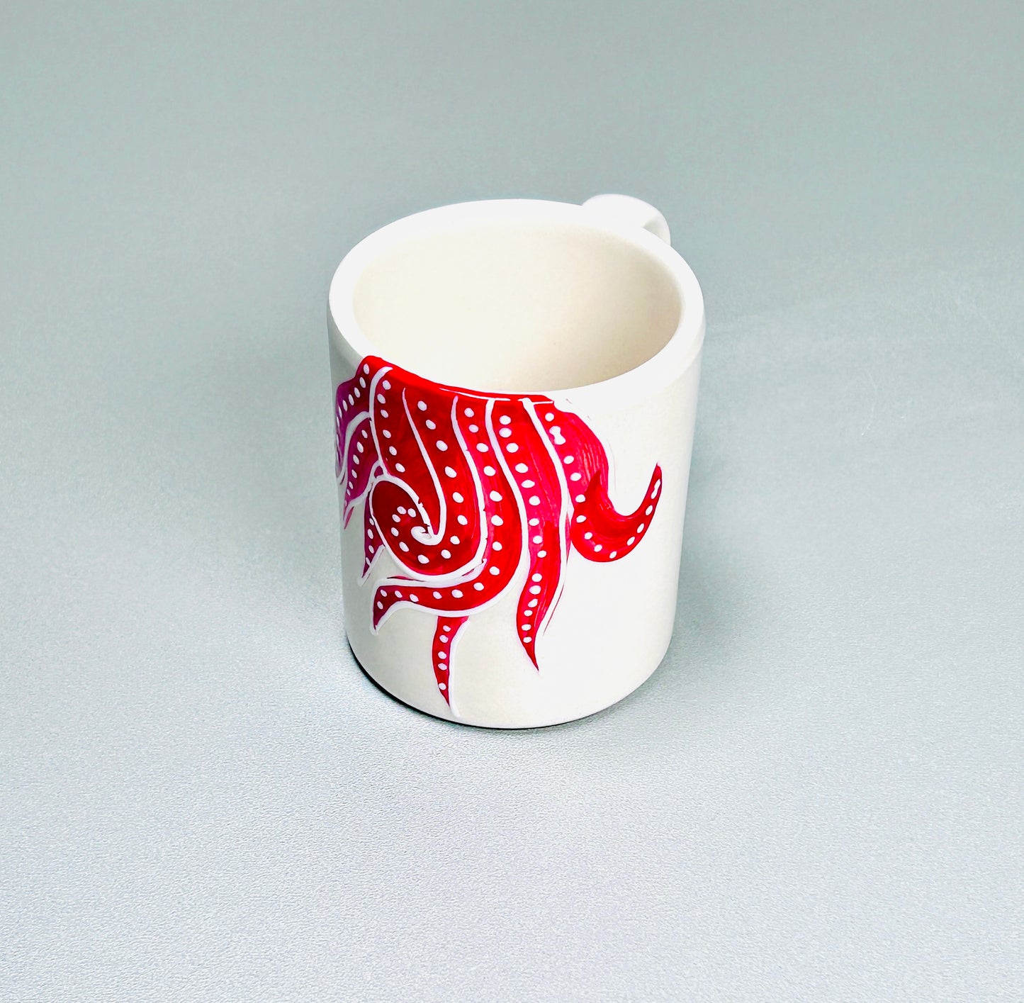Kaffeetasse rot "Paulchen die Krake" (Ø 8,5 cm Höhe: 9,5 cm)