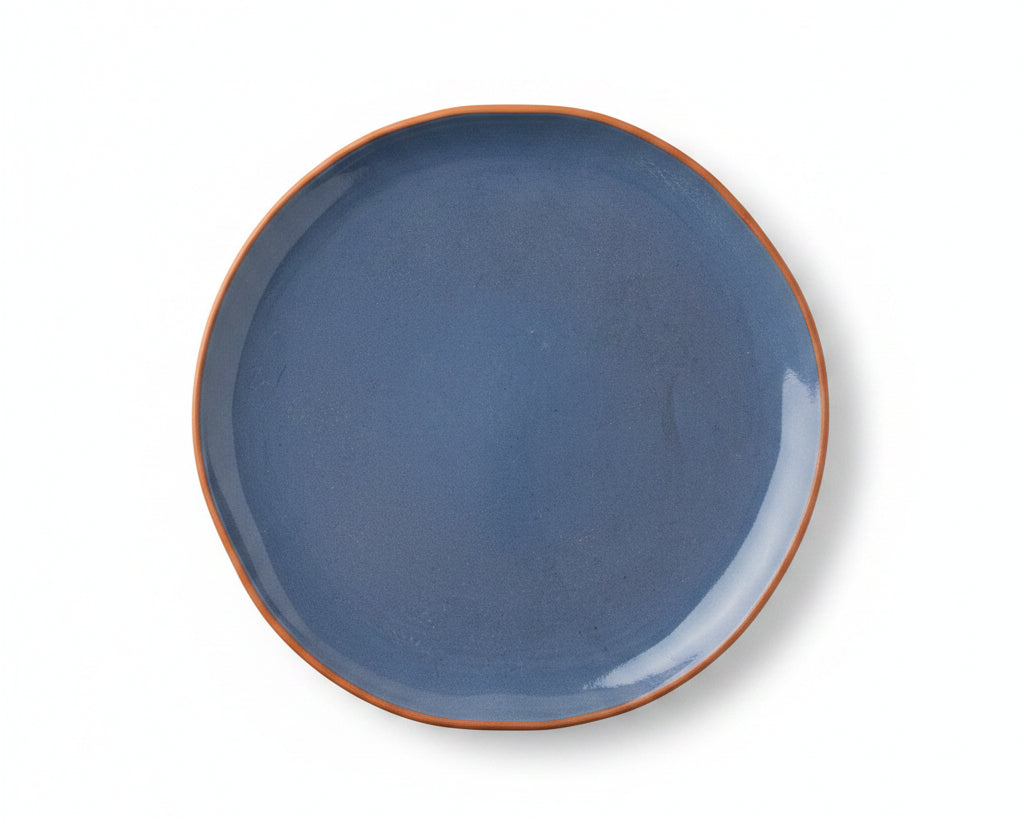 Handgefertigter Keramikteller – blau mit Terrakottarand Ø 23 cm