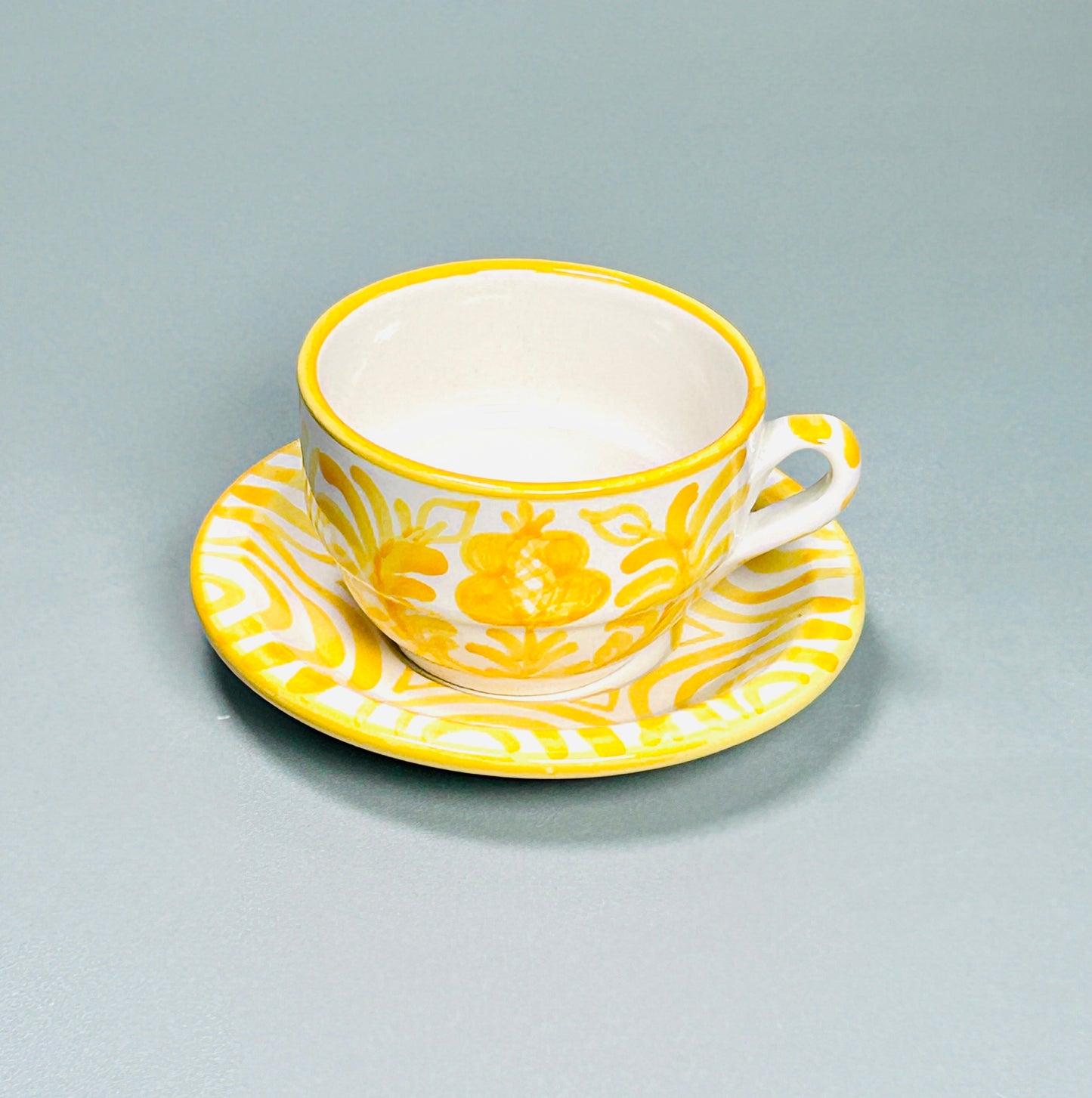 Kaffeetasse mit Untertasse "Blumen von Granada", gelb/weiß (Ø Tasse: 9 cm, Ø Untertasse: 13 cm Höhe: 6 cm)